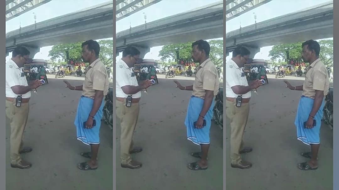 அனுமதிக்கப்படாத நேரத்தில் வந்த லாரியைத் தடுத்த போக்குவரத்து எஸ்.ஐயுடன் வாக்குவாதம் செய்த லாரி ஓட்டுநர்